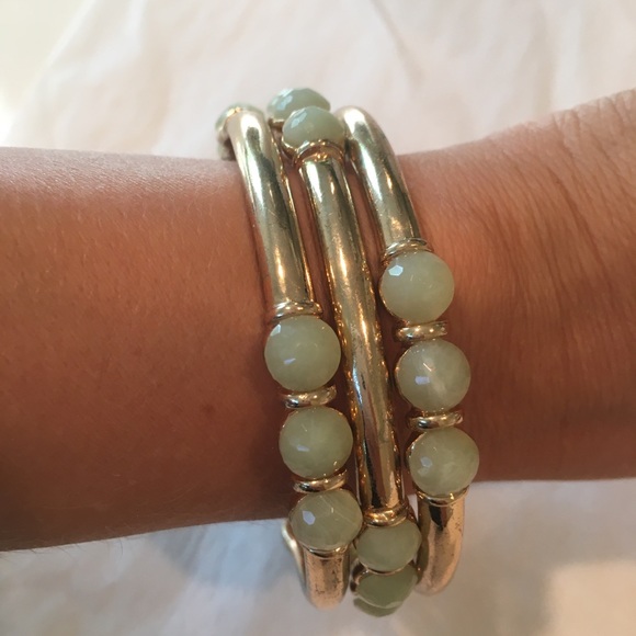 Set of 3 bangles. Gold with light blue stones. - Picture 3 of 4